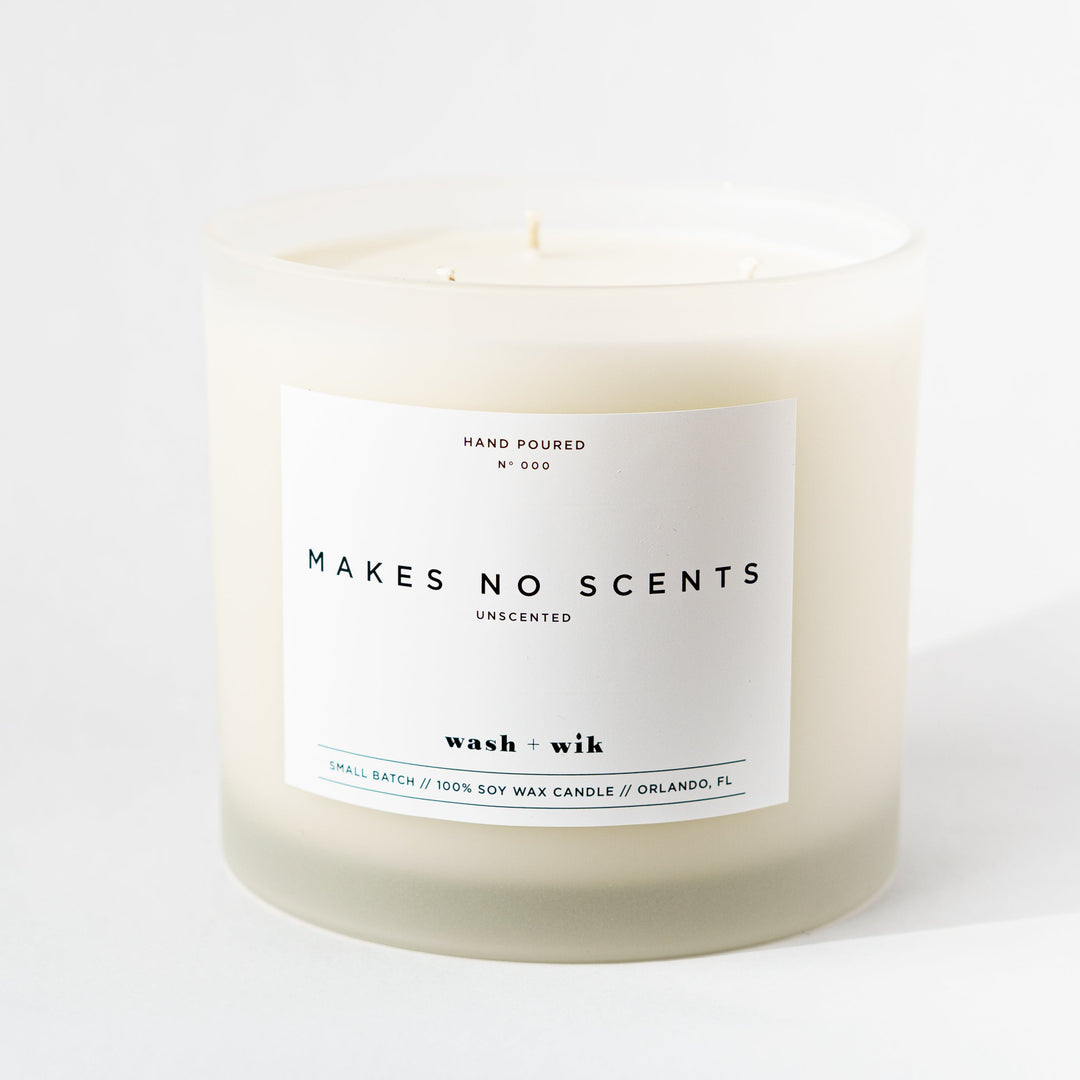 Candle with a label on a white background