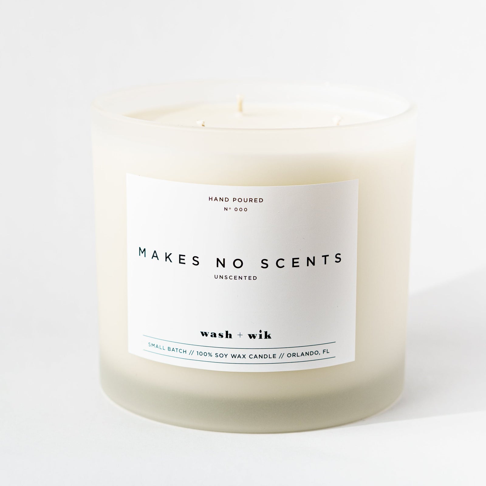 Candle with a label on a white background