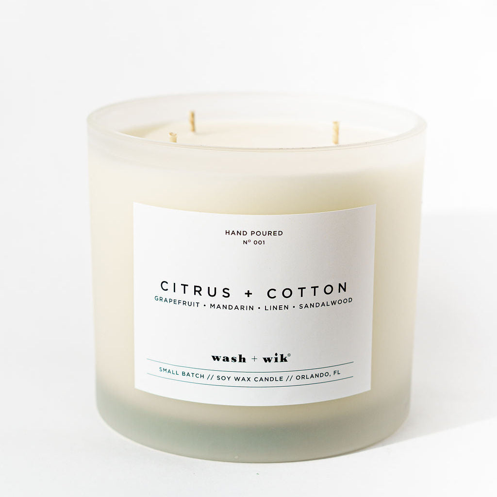Candle with a label on a white background