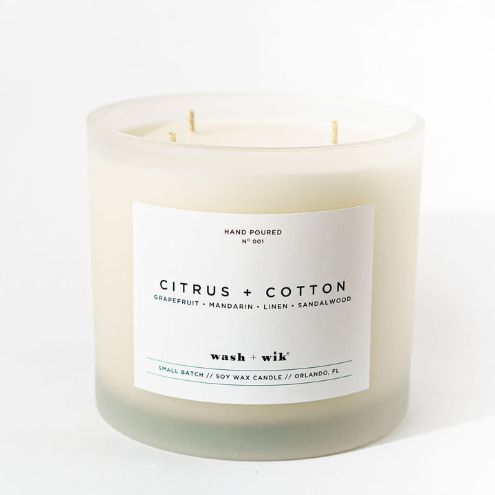 Candle with a label on a white background