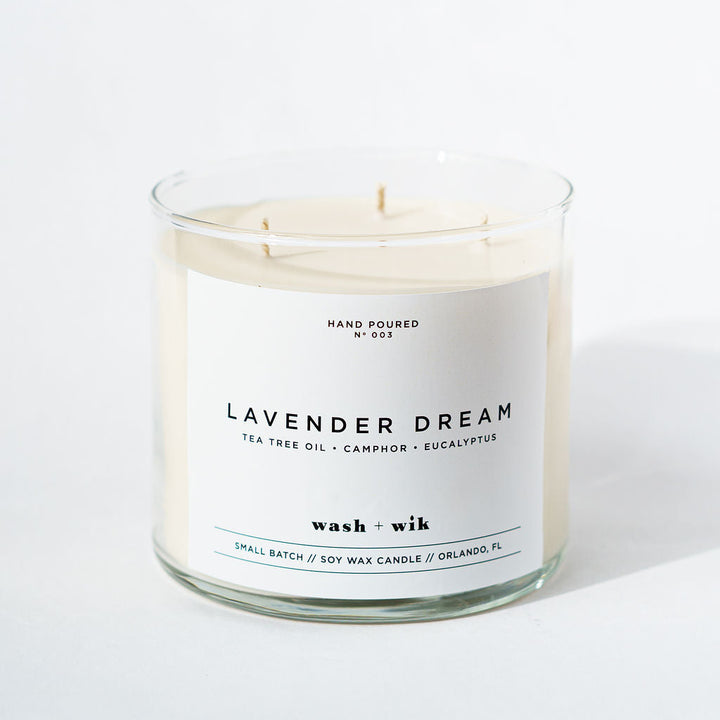 Lavender Dream candle with a white label on a white background