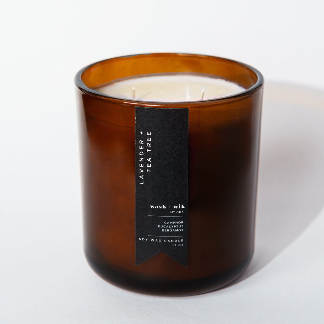 brown candle with black label and white background