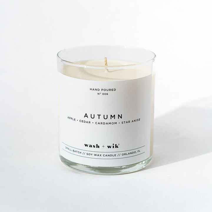Candle with a label on a white background