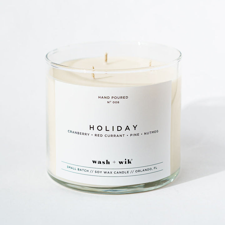Candle with a label on a white background