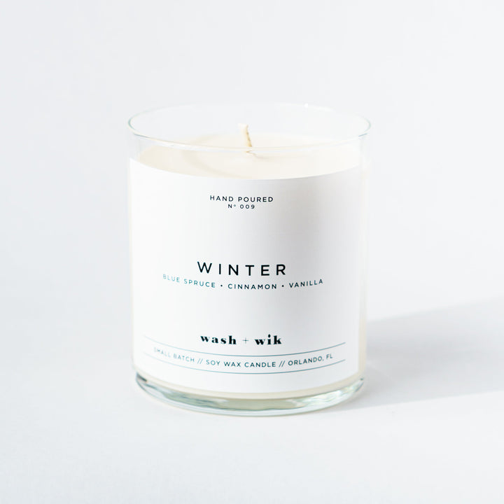 Candle with a label on a white background