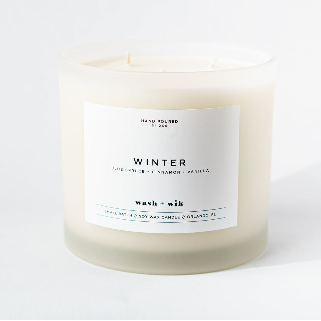 Candle labeled &