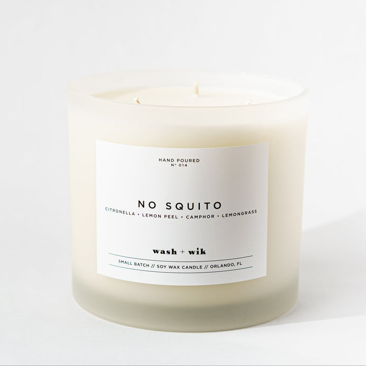 Candle with a label on a white background