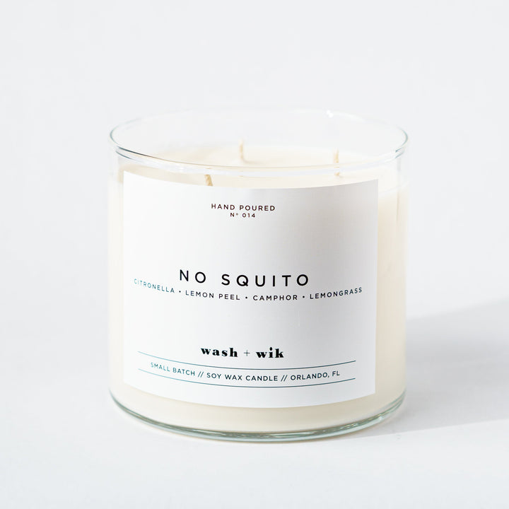 Candle labeled &