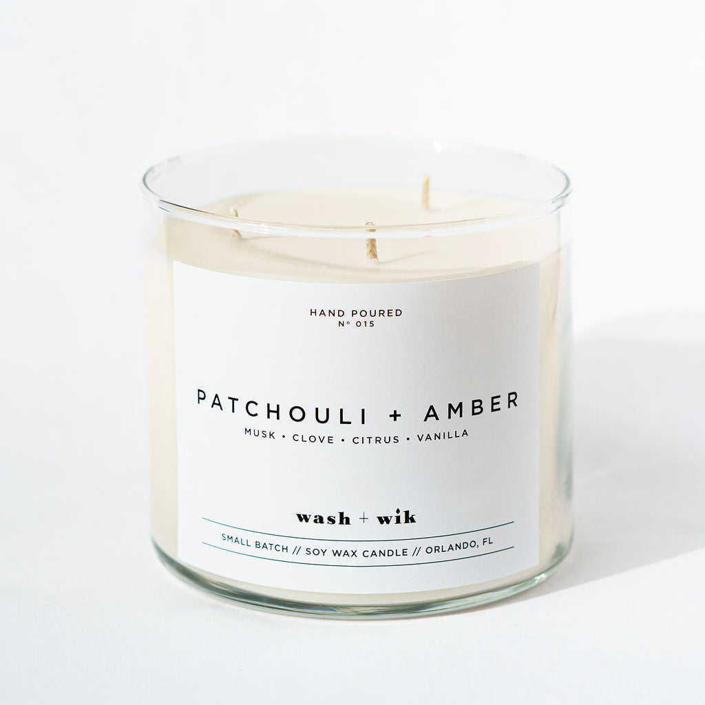 Candle with a label reading &