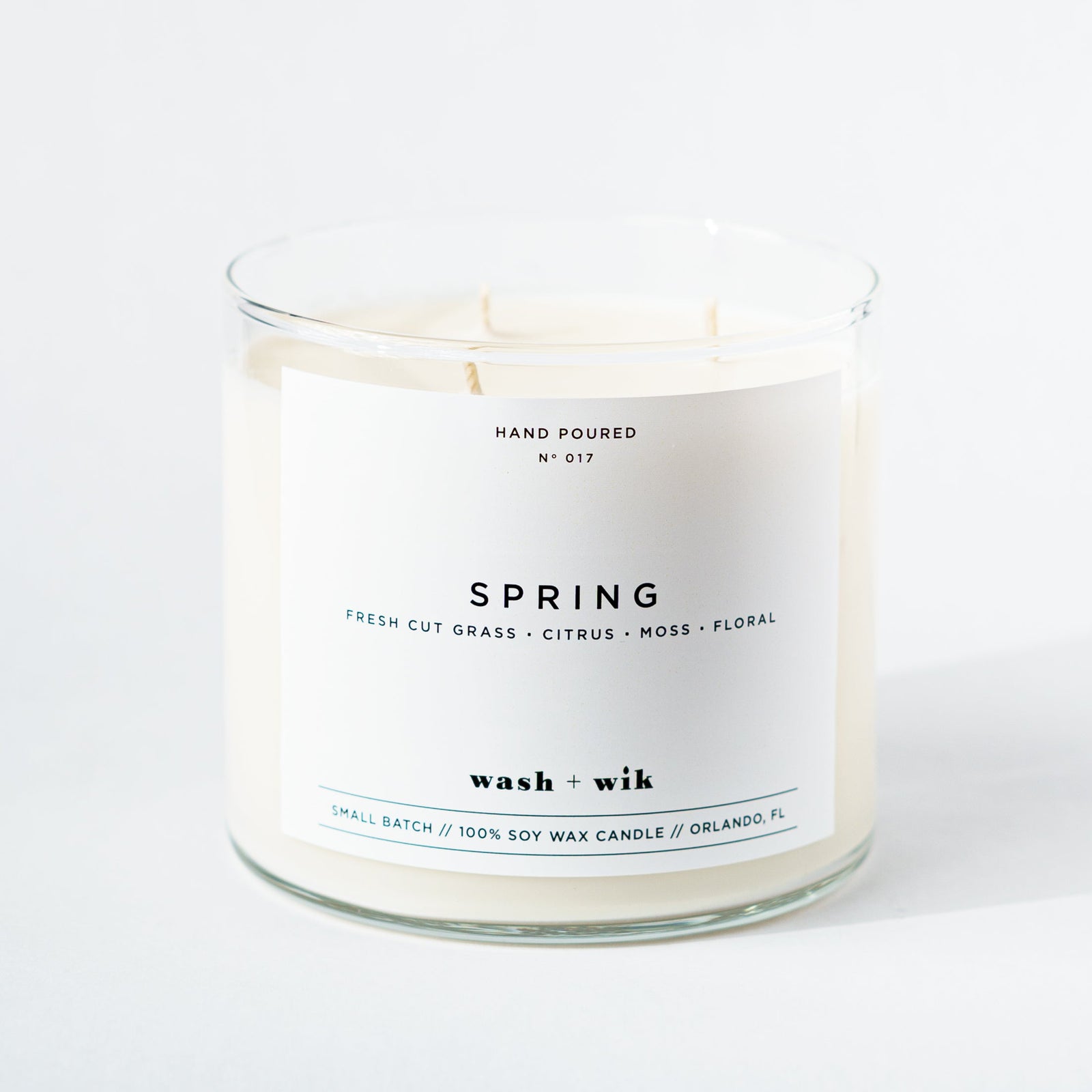Candle with a label on a white background