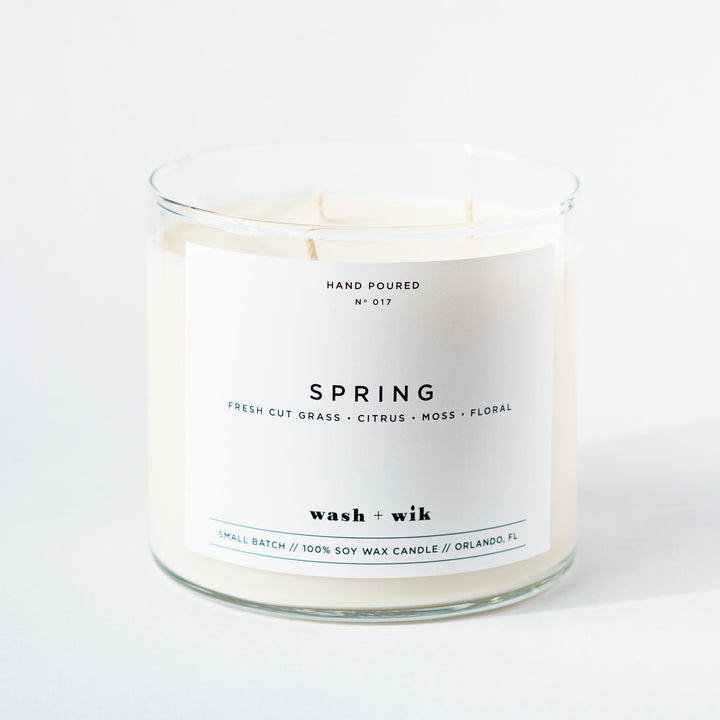 Candle with a label on a white background
