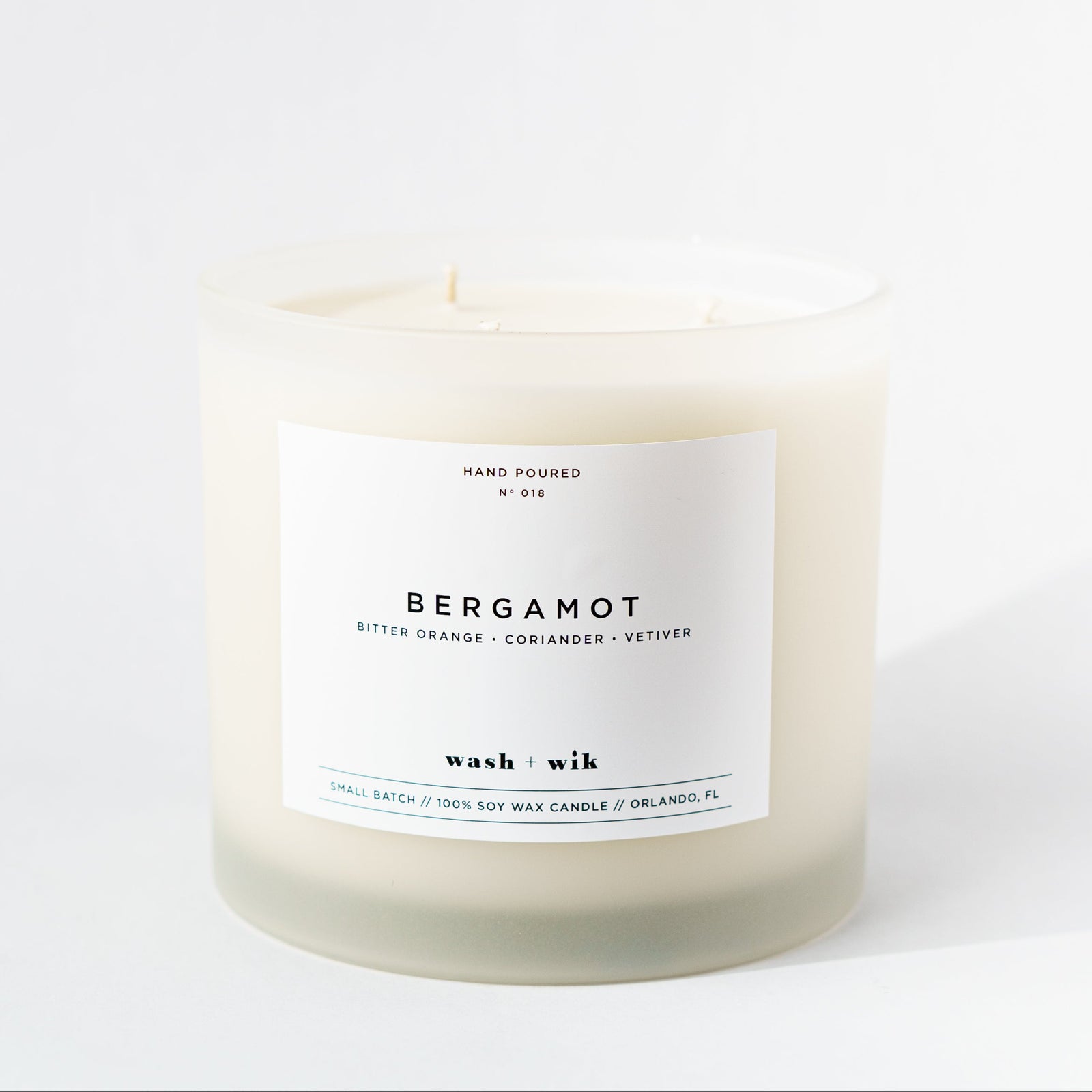 Candle with a label on a white background