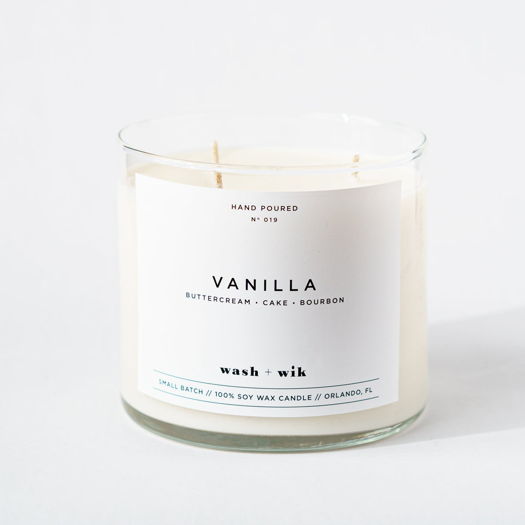 Vanilla candle with a white label on a white background