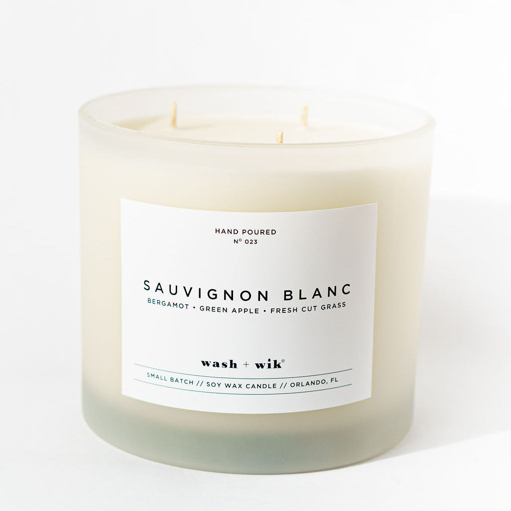 Candle labeled &
