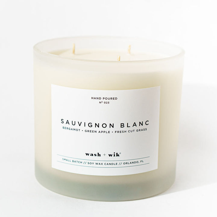 Candle labeled &