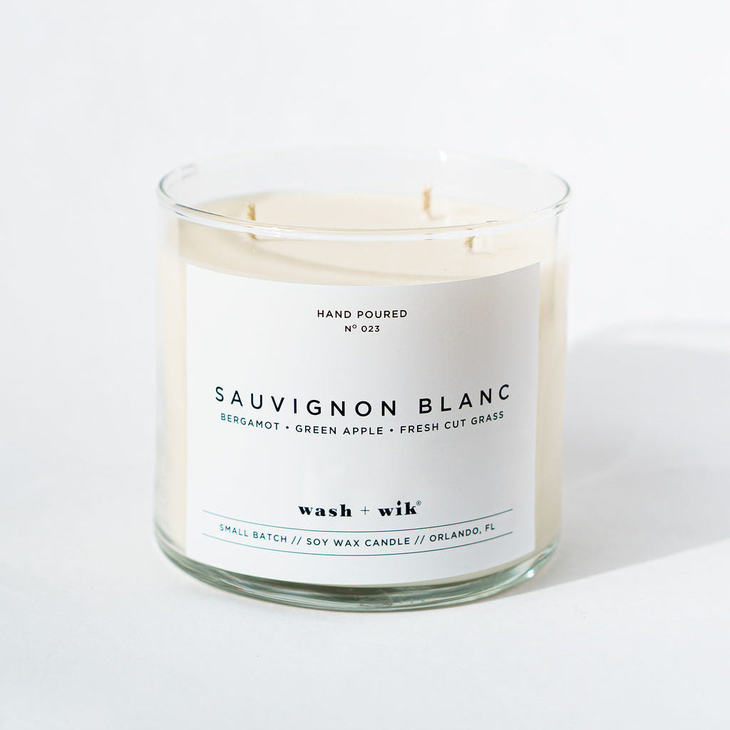 Sauvignon Blanc candle with a label on a white background