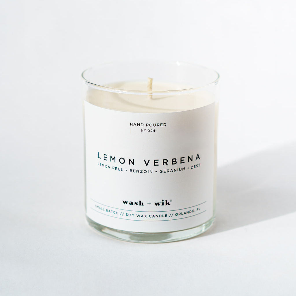 Lemon Verbena candle with a white label on a light background
