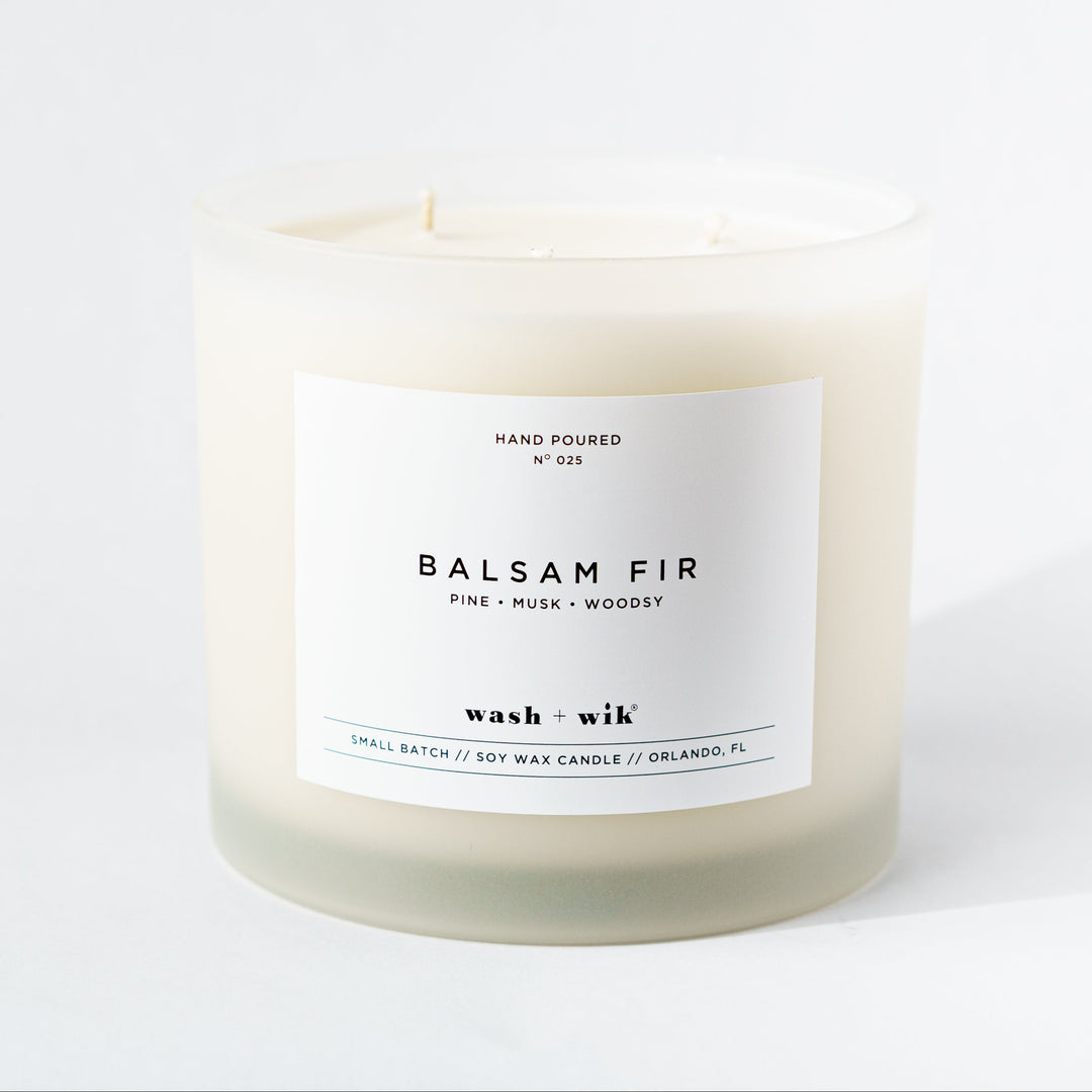 Candle labeled &