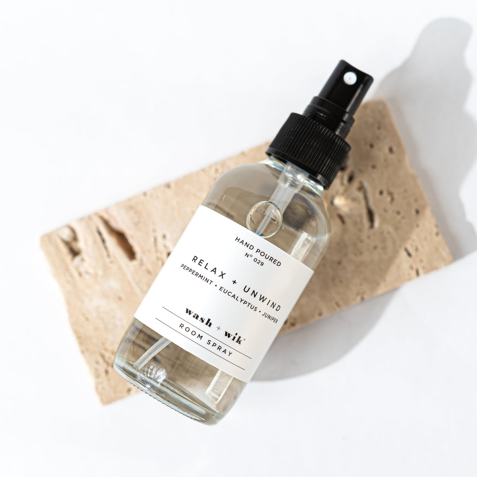 Bottle of hand soap with a label on a white background