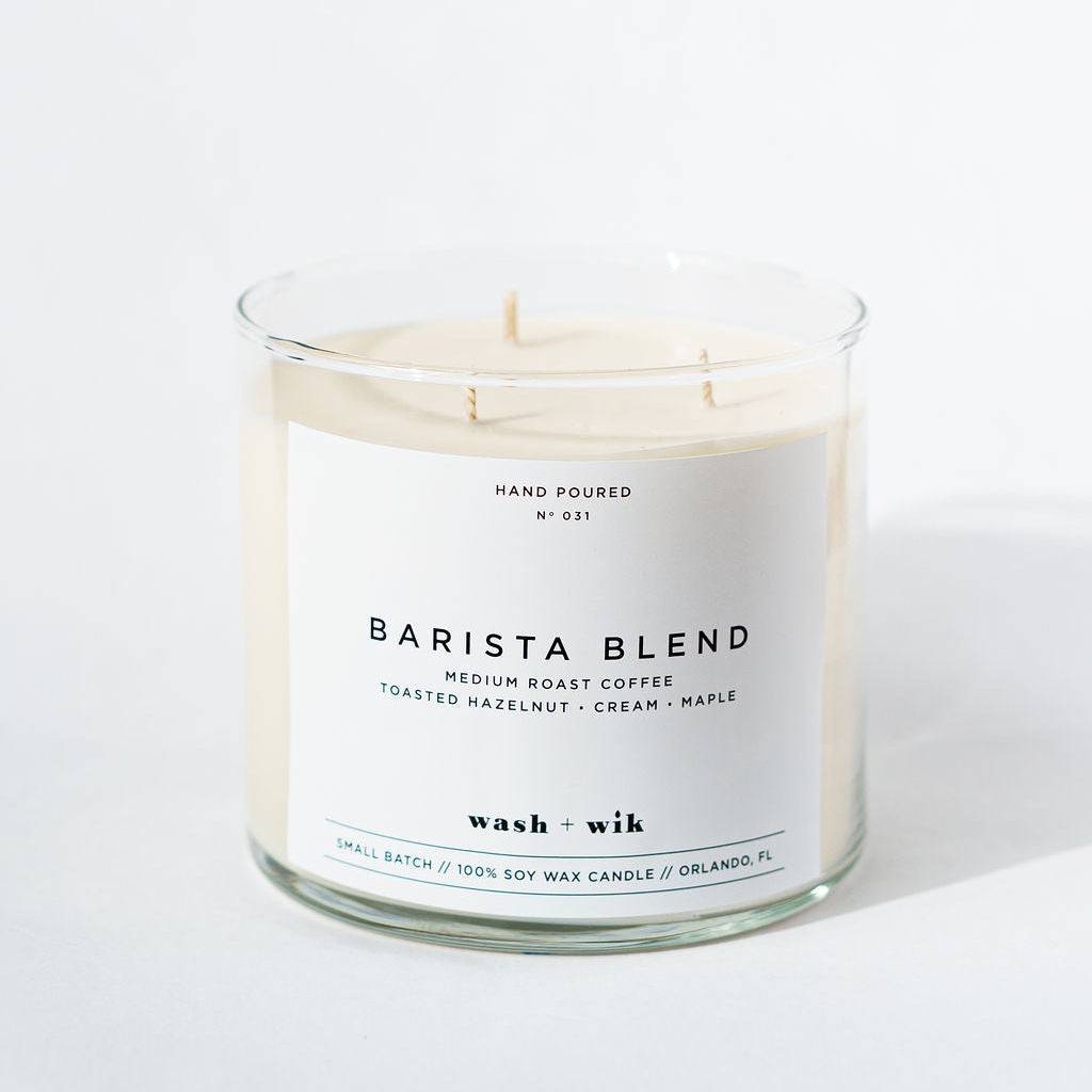 Barista Blend candle in a glass jar with a white label on a light background