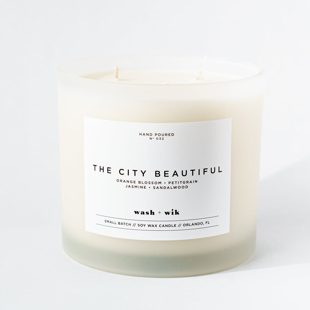 Candle labeled &