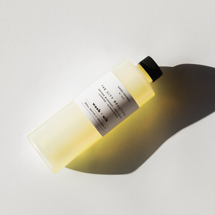 Yellow bottle with a label on a white background