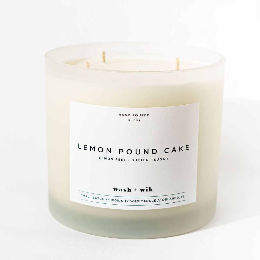 Lemon pound cake scented candle with a white label on a white background