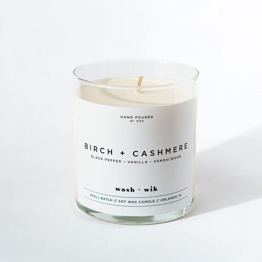 Candle with a label on a white background