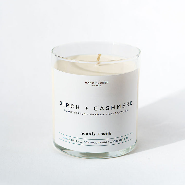 Candle with a label on a white background