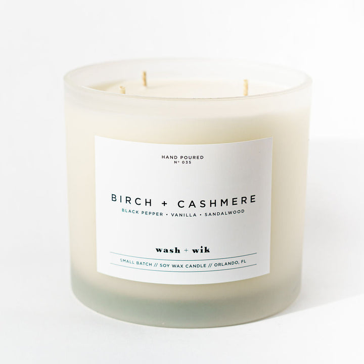 Candle labeled &