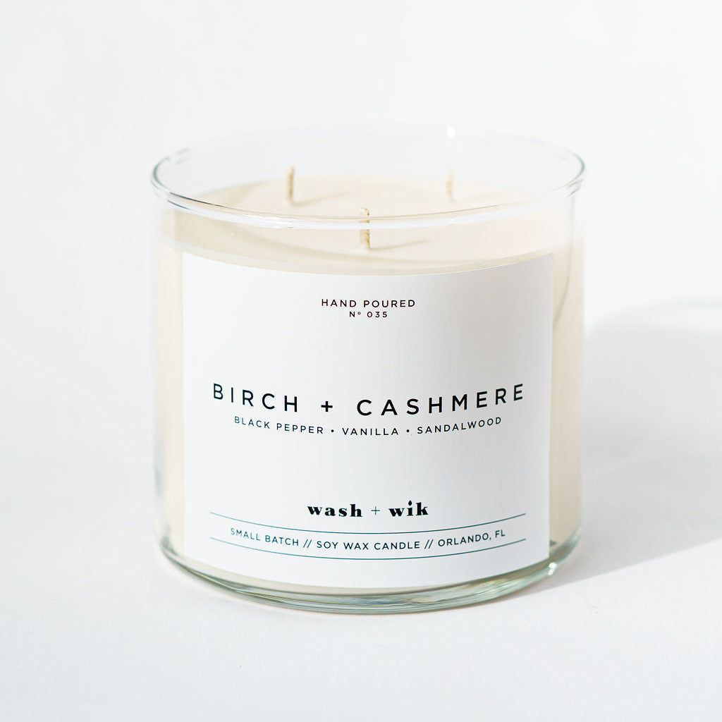 Candle with a label on a white background