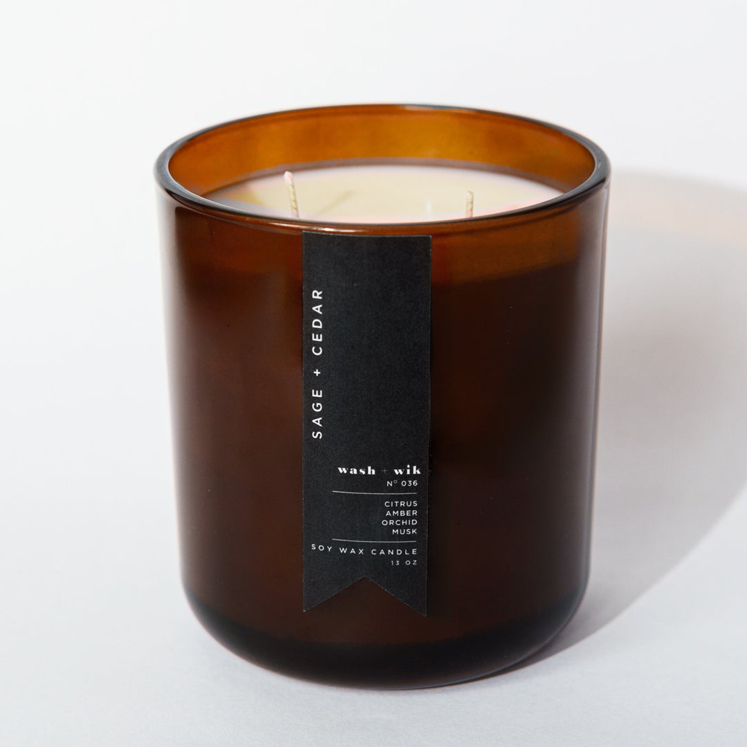 brown candle with black label and white background