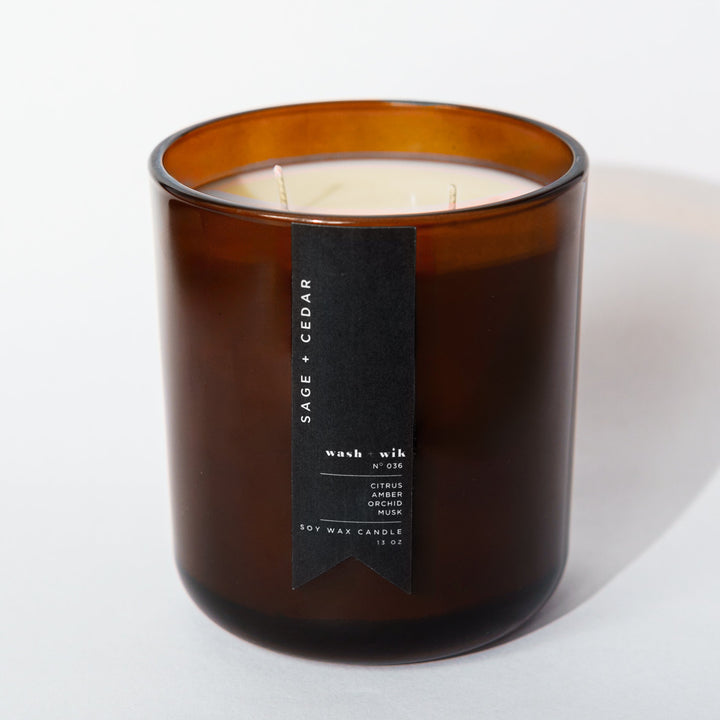 brown candle with black label and white background