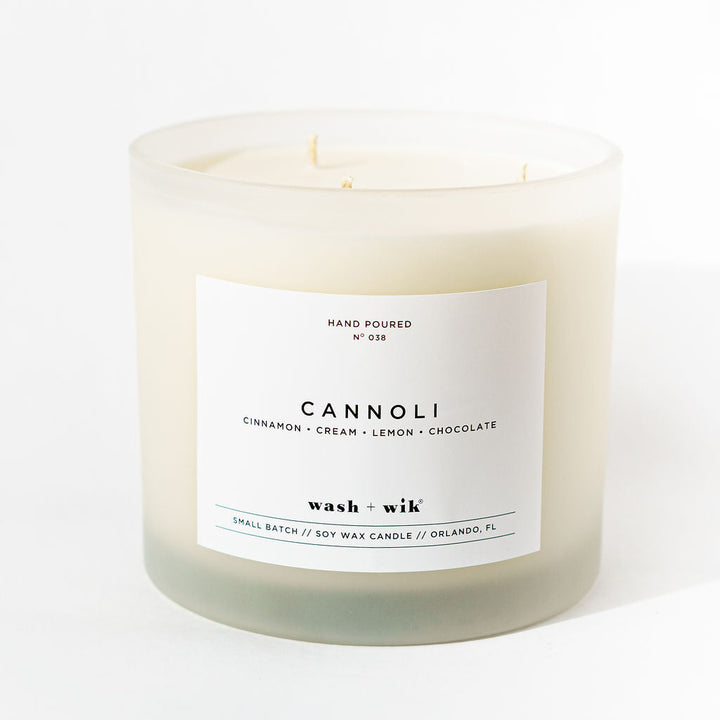 Candle labeled &