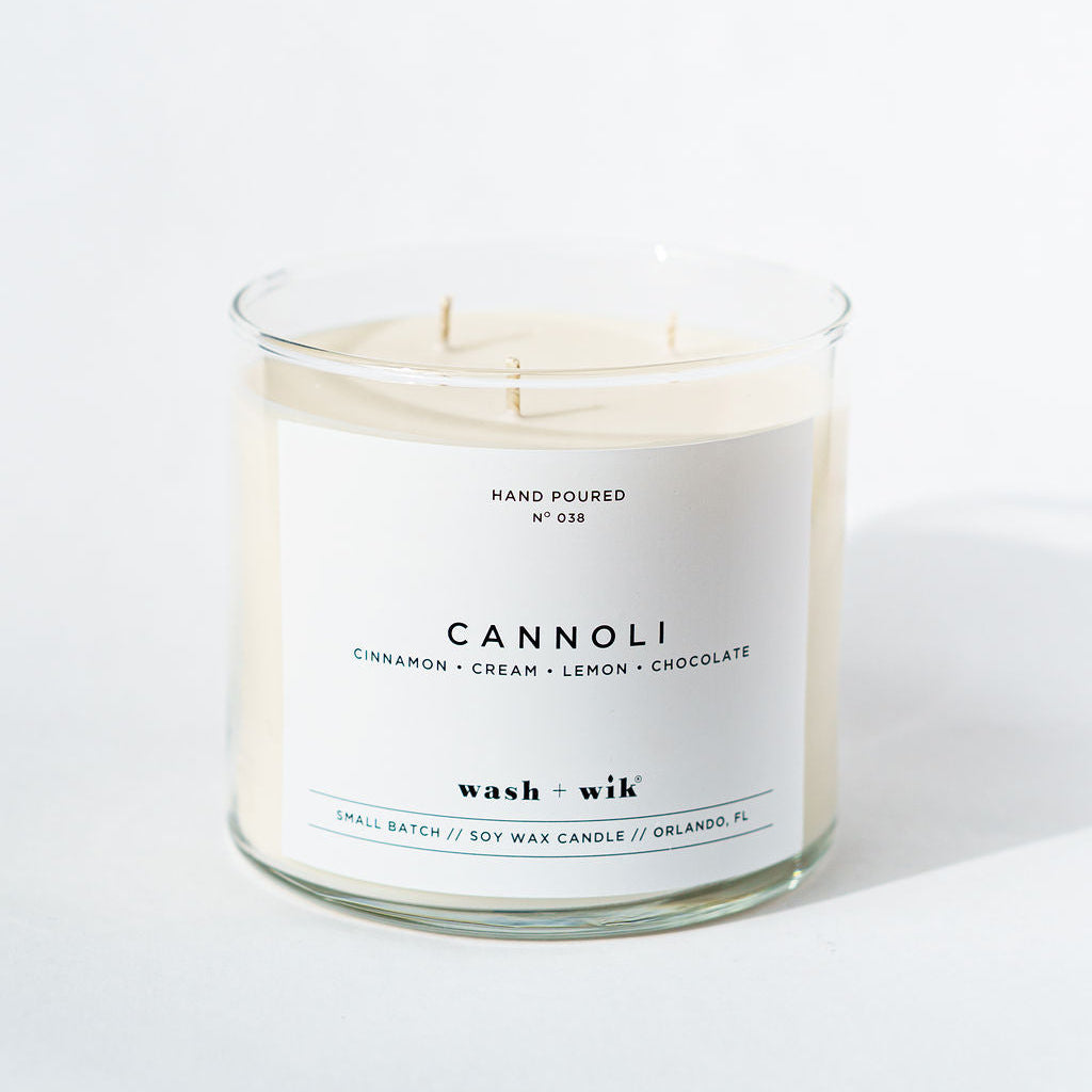 Candle labeled &