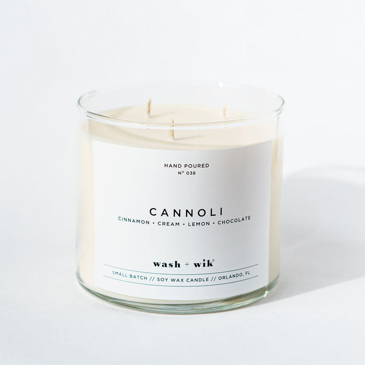 Candle labeled &