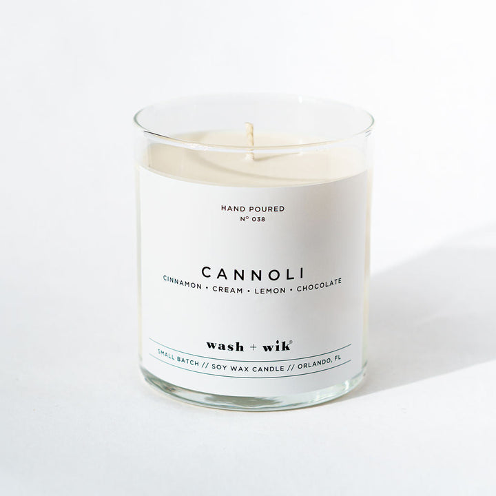Candle labeled &