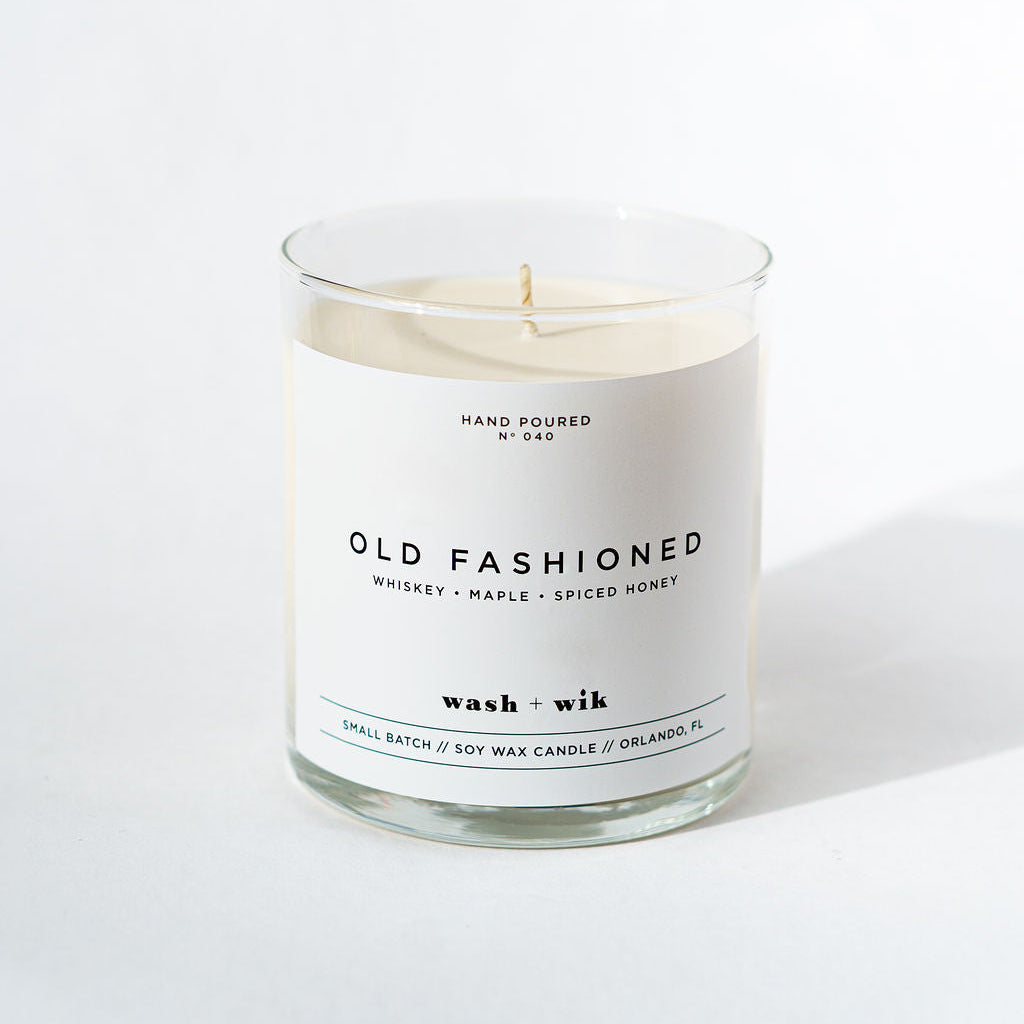 Candle with a label on a white background