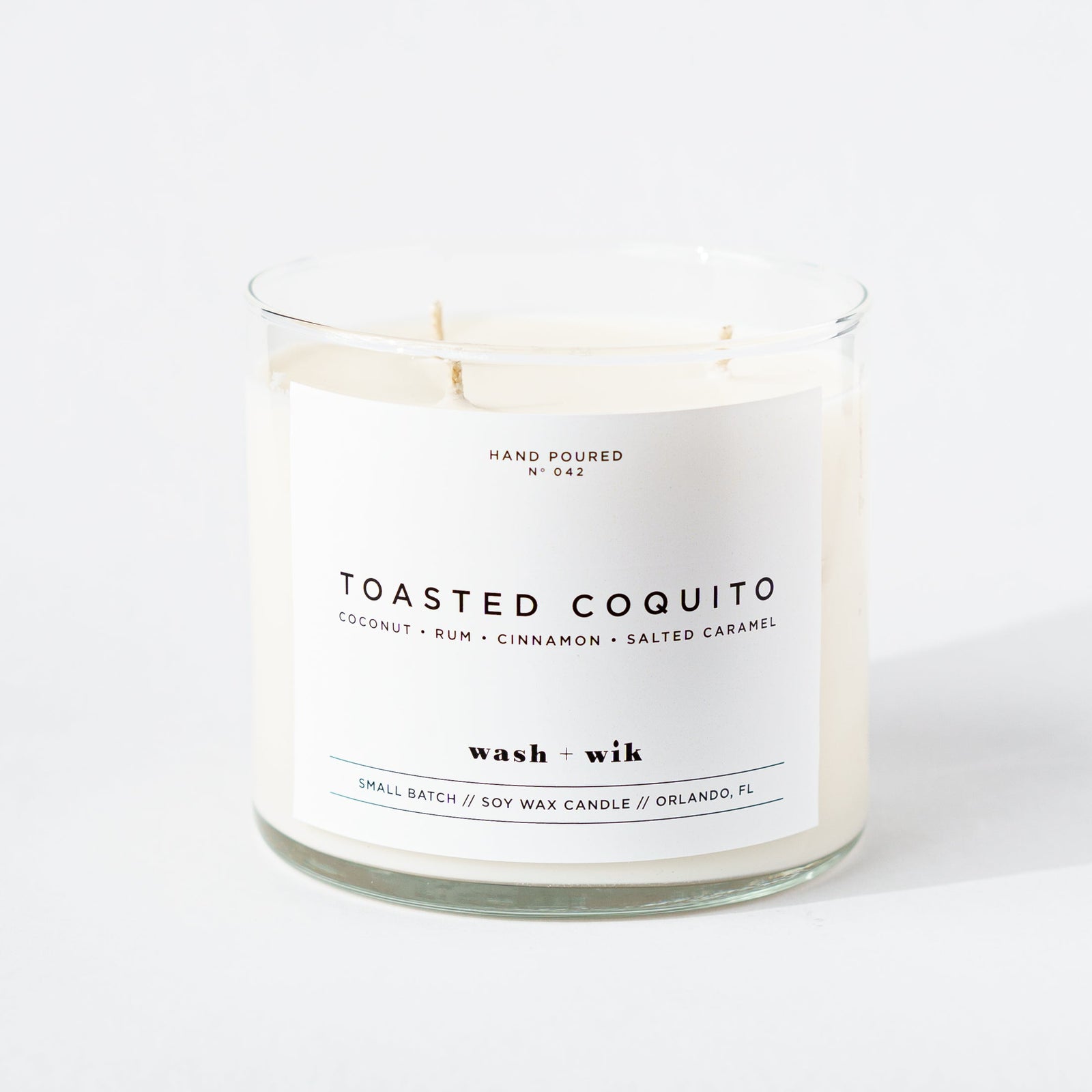 Candle with a label on a white background
