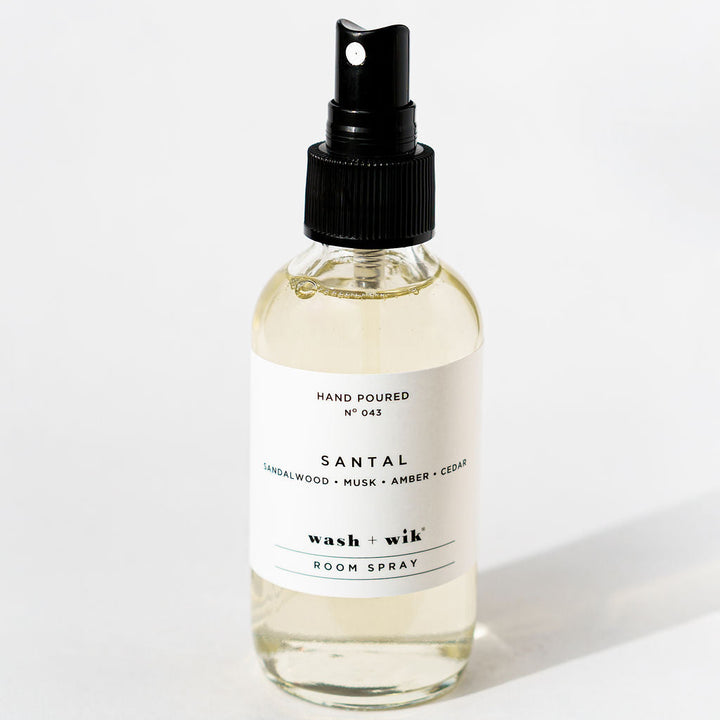 Room spray bottle with a black sprayer on a white background