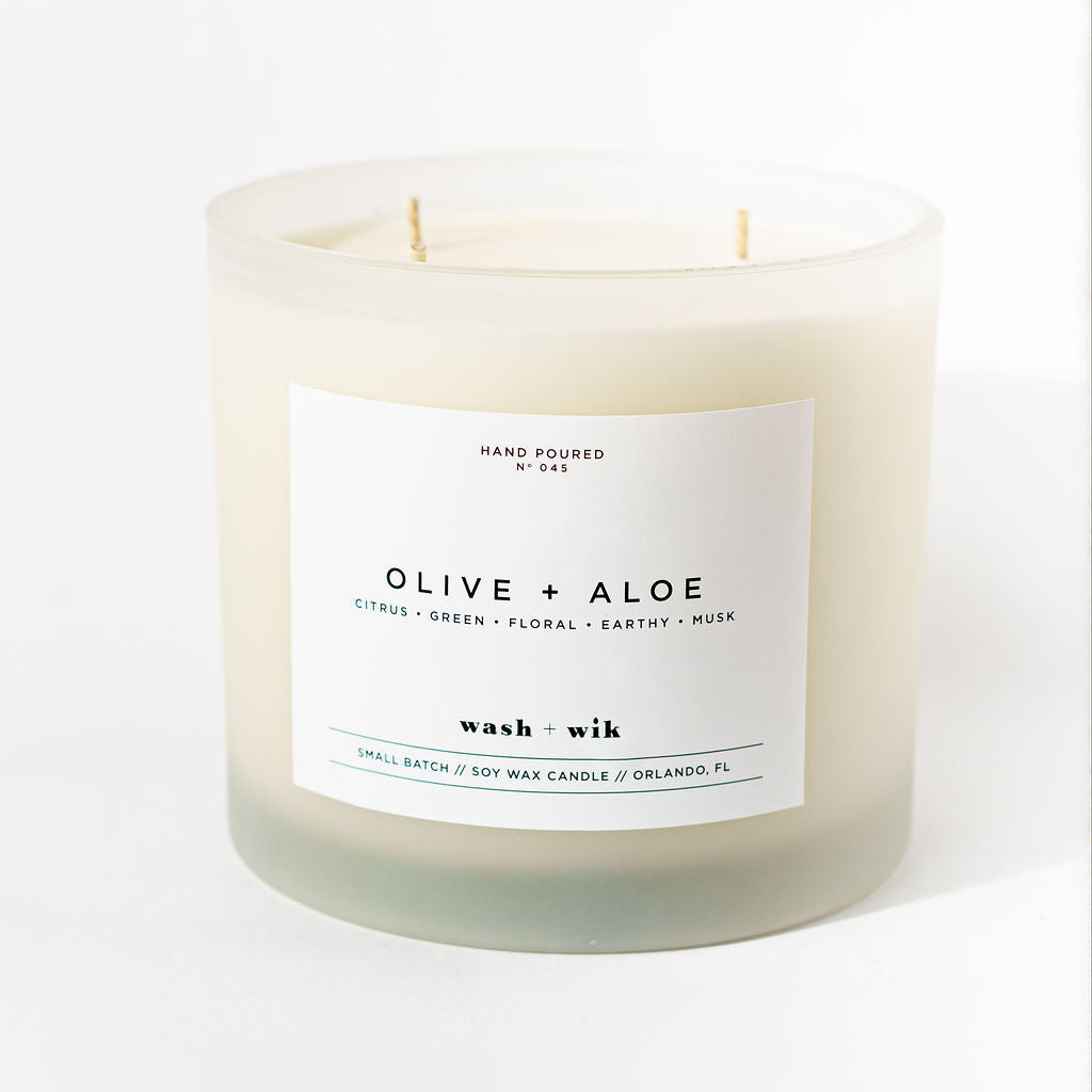 Candle with a label on a white background