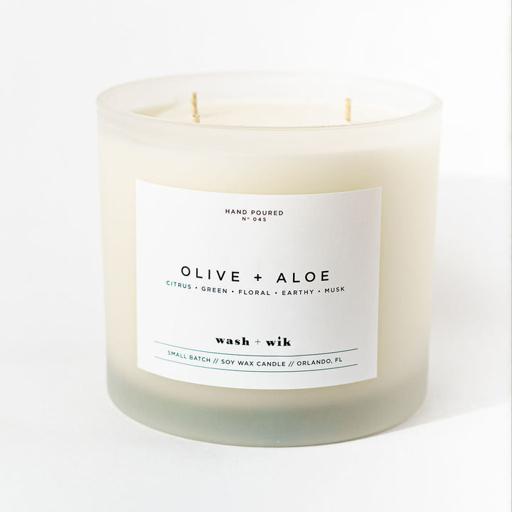 Candle with a label on a white background