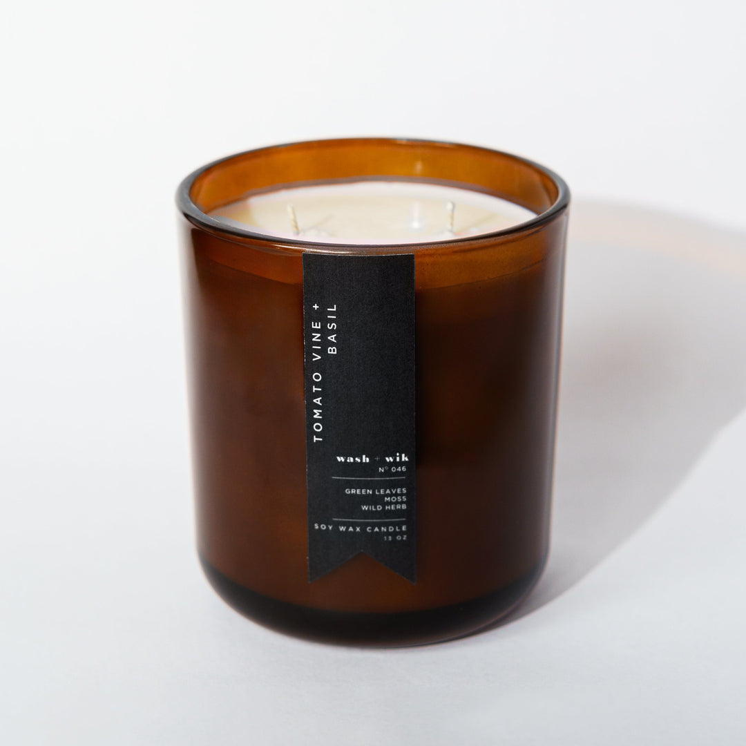 Brown candle with a label on a white background