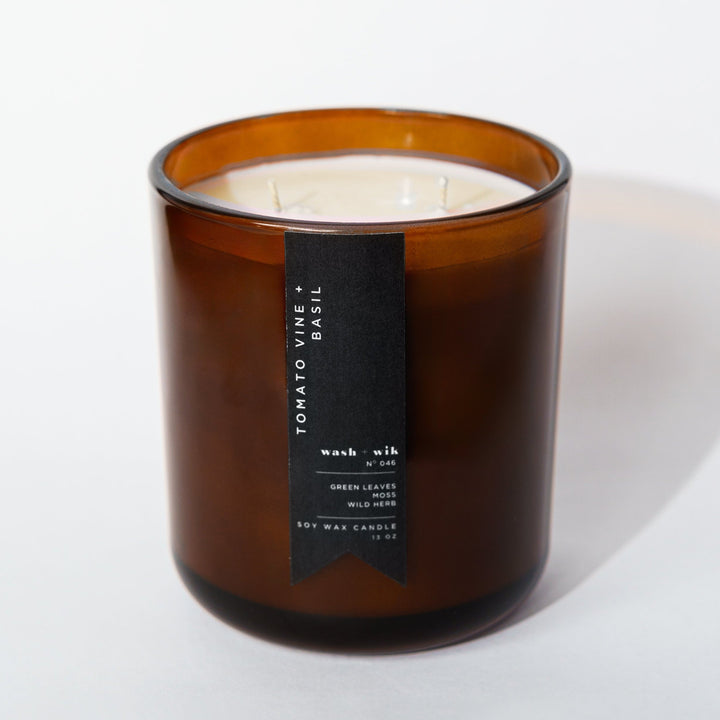 Brown candle with a label on a white background