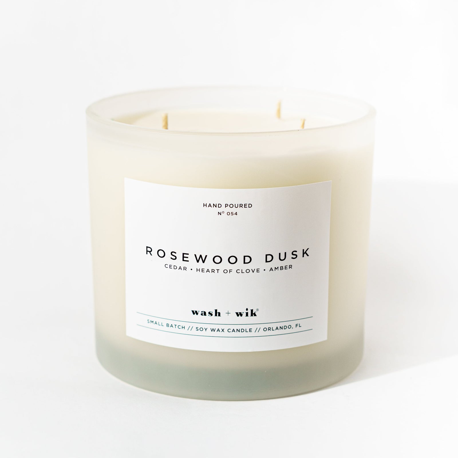 large 3 wick candle on white background
