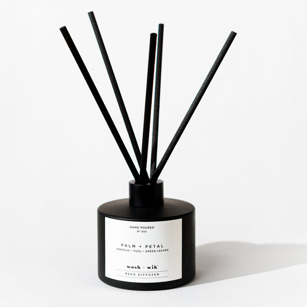 Black reed diffuser bottle with 6 reeds