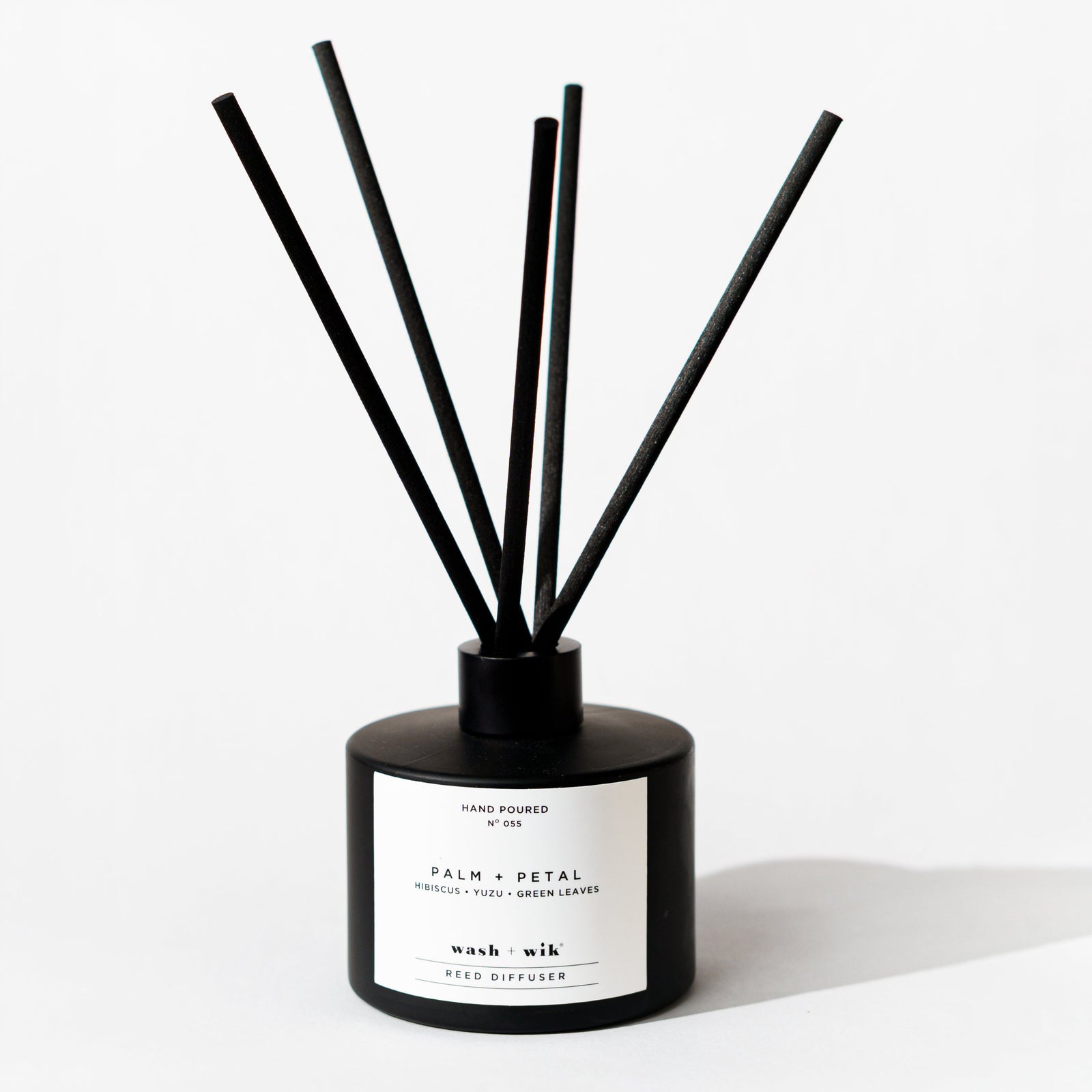 Black reed diffuser bottle with 6 reeds