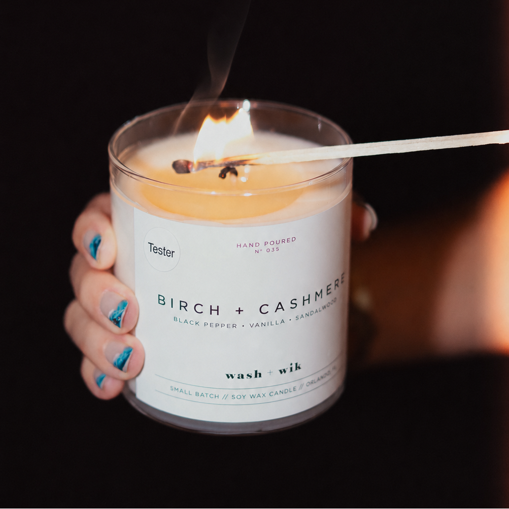 Candle labeled &