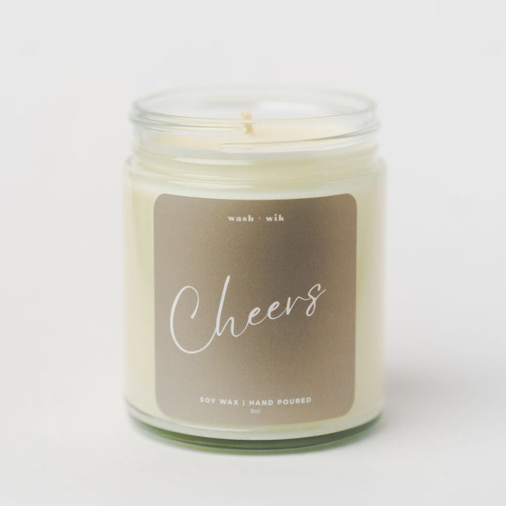 Candle in a glass jar with a &