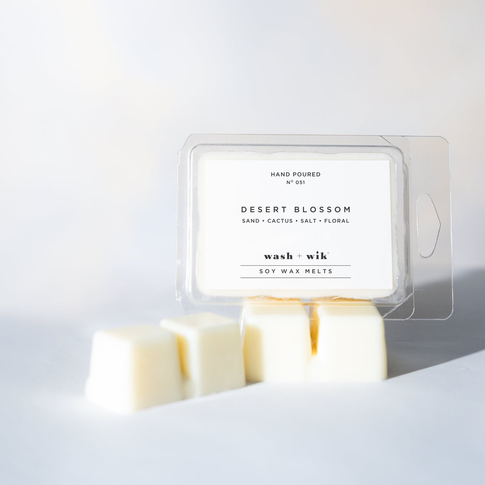 Wax melt packaging labeled 'Desert Blossom' on a white background